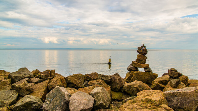 La Malbaie, Canada - August 17 2020: Stunning landscape view with the prayer stones by the saint lawrence river in La Malbaie in Quebec