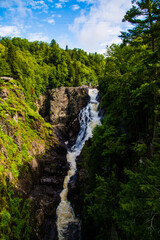 Ste-Anne Cayon, Canada - August 21 2020: The great waterfall in Ste-Anne Cayon in Quebec