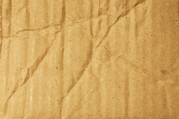 Rumpled brown corrugated cardboard or box texture background.