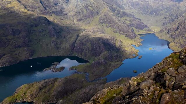 Isle of Skye mountains landscape Loch Na Cuilce view from peak of Sgurr Na Stri in Scotland - boats on sea bay