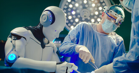 Robotic surgery. Professional medical surgeon operates on patient in hospital with participation of...