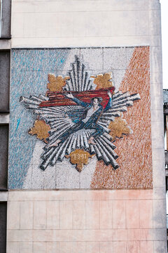 Relief on the building wall representing liberation movement of partisans in the World War 2, Uzice, Serbia