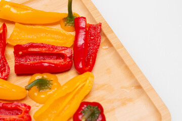 sliced and fresh yellow and red bell peppers