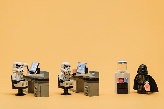 Vader and Stormtroopers in the office. Business concept