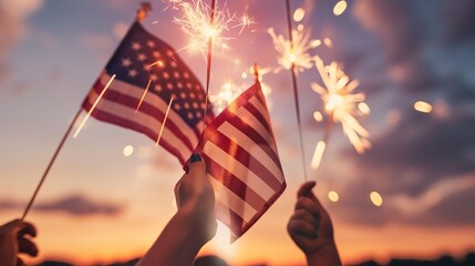 Usa Celebration With Hands Holding Sparklers And American Flag At Sunset With Fireworks - obrazy, fototapety, plakaty