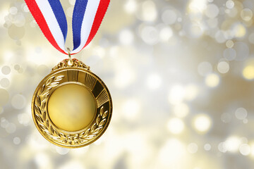 First place golden medal award in front of blurred background  - 756794807