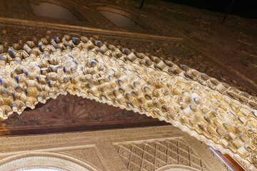 Detail of beautiful moorish stone artwork ornaments, Granada, Andalusia, Spain