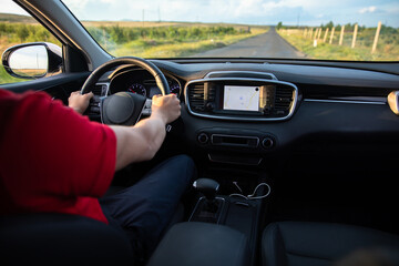 The driver follows the directions of the navigator, photo from inside the car, stock photo