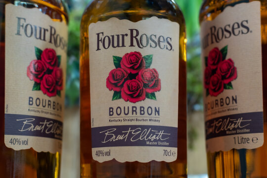 Bottle of Kentucky bourbon Four Roses close-up on blurred background. Ukraine, Zhytomyr, March, 12, 2024