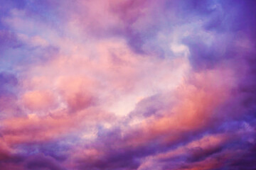 Blue purple lilac magenta orange gold pink white evening sky. Colorful bright sunset background....