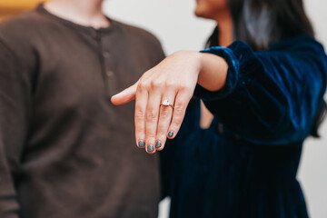 Couple showing engagement ring, close up, love, getting married