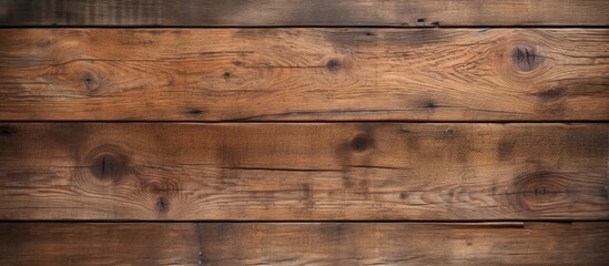 A closeup shot of a brown hardwood plank with wood stain and varnish on a beige wooden surface, with a blurred background showcasing the natural beauty of the lumber - Powered by Adobe
