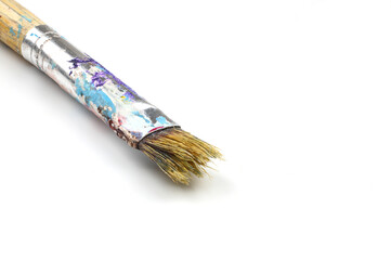 Artistic brushes close up. Watercolor paints in the background. Background with brushes and paints.