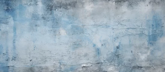 Foto op Canvas A closeup of a freezing blue and gray concrete wall resembling a cumulus cloud pattern. The electric blue hue brings to mind the winter landscape and meteorological phenomena © AkuAku