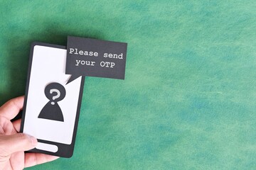 Send password text message smishing scam concept. Hand holding mobile phone with message from...