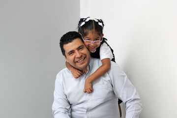 Divorced single dad with his 4 year old brunette Latina daughter dressed in school uniform spending...