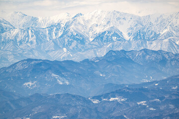 志賀高原の焼額山から眺める北アルプスを望む須坂市、長野市方面の風景
