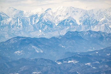 Muurstickers 志賀高原の焼額山から眺める北アルプスを望む須坂市、長野市方面の風景 © apiox