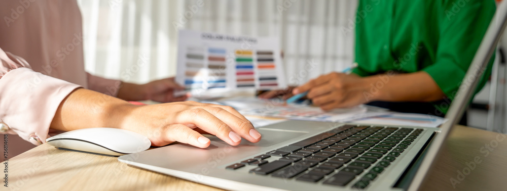 Poster creative graphic design presents selective color while manager using laptop comparing suitable color