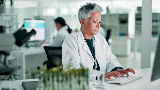 Science, laboratory and senior woman on computer for research, website and online analysis. Pharmaceutical, healthcare and doctor on pc for medical innovation, internet search and report in clinic