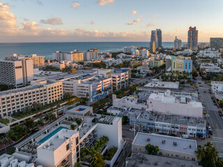 Aerial sunset over Miami South Beach with luxury residential buildings, Art Nuevo houses
