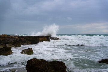 Rough sea with waves hitting the reef 3