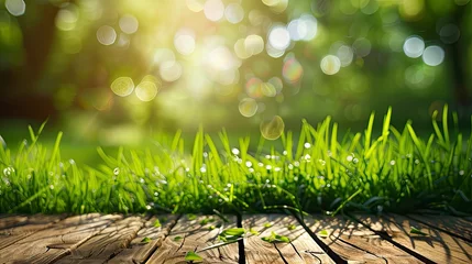 Outdoor kussens Fresh spring green grass with green bokeh and sunlight and wood floor. Beauty natural background - generative ai © Nia™
