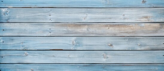 Obraz premium Detailed light blue old wooden wall texture with close-up of wood plank fence.