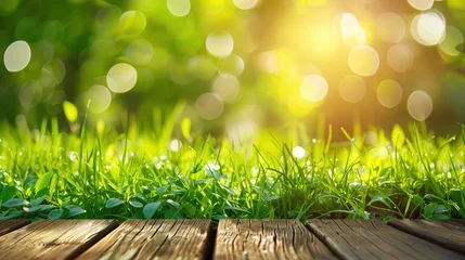 Zelfklevend Fotobehang Fresh spring green grass with green bokeh and sunlight and wood floor. Beauty natural background - generative ai © Nia™