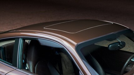 Sun roof of a brown car