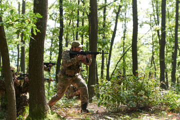 A specialized military antiterrorist unit conducts a covert operation in dense, hazardous woodland, demonstrating precision, discipline, and strategic readiness