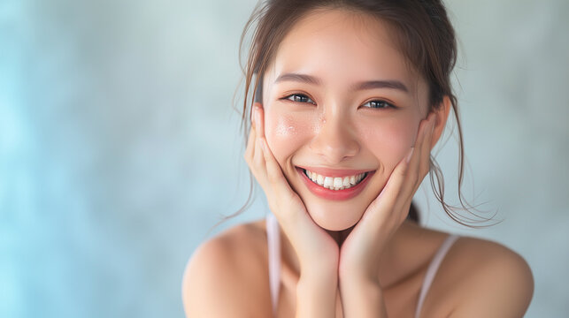 Beautiful Japanese woman in her 20s doing skin care, clear white skin and glossy lips, close-up　スキンケアする美しい女性
