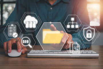 DMS, Document management system concept, Businessman using computer on desk with Document management system icon on virtual screen.