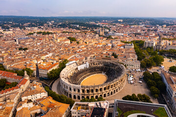 Aerial view of historical area of French city of Nimes overlooking restored antique Roman...