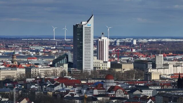 Ultra telephoto shot of downtown Leipzig. University tower in the middle of the picture. Leipzig's tallest city skyscraper. Next to it is the winter garden high-rise building.