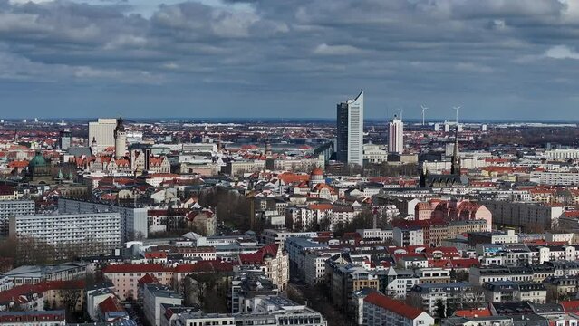 Telephoto shot of the city of Leipzig. The city center captured compactly in one image. sunny day in spring. See several city landmarks.