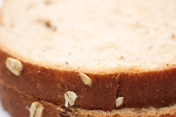 details of wholemeal bread. slices of bread with selective focus. meal details.