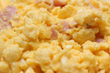 scrambled eggs with cheese and ham. details of scrambled eggs. meal details.