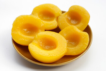 Peach halves in syrup. Fruity desserts