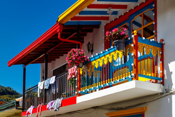 Colorful balconies with hanging clothes in Jardin, Colombia