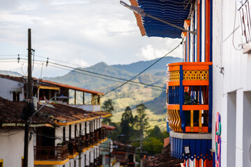 Colorful balconies with hills in the background in Jerico, Colombia