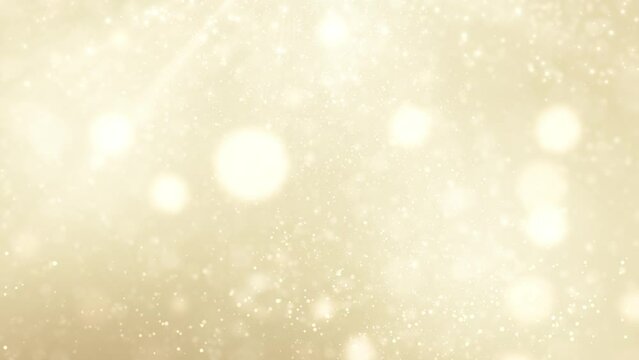 Abstract golden Christmas background with shimmering bokeh lights for a festive holiday design.
