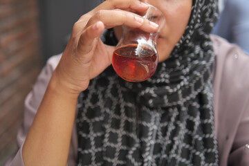 women drinking Traditional turkish tea