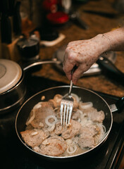 chef preparing food pork steaks cuban style cuisine miami