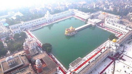 Fototapeta na wymiar The Golden Temple also known as the Harimandir Sahib Aerial view by DJI mini3Pro Drone city of Amritsar, Punjab, India.