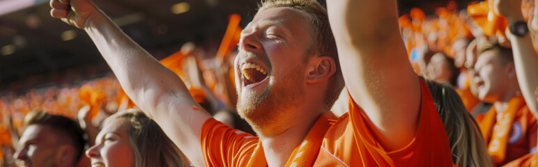 Dutch football soccer fans in a stadium supporting the national team, Oranje 
 - obrazy, fototapety, plakaty