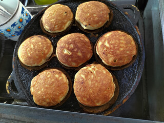 Close up of traditional Indonesian street food and the process of making it. Sweet kamir or dorayaki.
