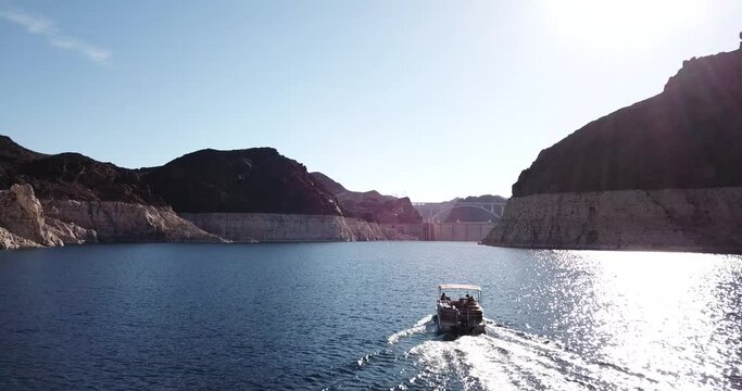 boat approaching the hoover dam
