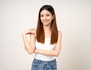 Obraz premium Beautiful smiling happy young asian woman age around 25. Charming female lady standing pose on isolated white background. Asian attractive woman people looking camera confident with backdrop.