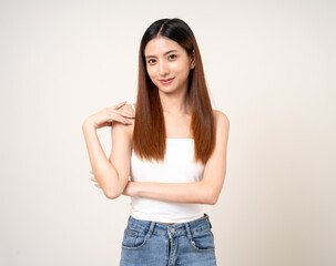 Fototapeta premium Beautiful smiling happy young asian woman age around 25. Charming female lady standing pose on isolated white background. Asian attractive woman people looking camera confident with backdrop.